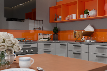 L-shaped kitchen with fluroescent orange and dove grey finish