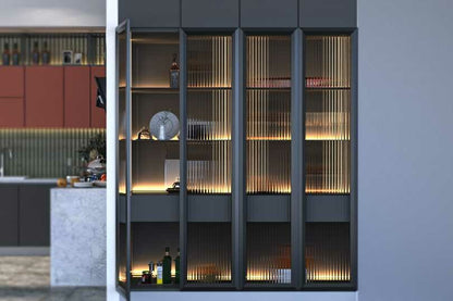 L-shaped kitchen with light coral and fluted glass tall units